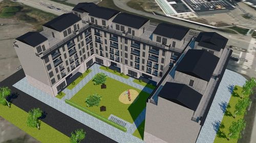 En skiss av ett stort bostadsprojekt i stadsmiljö med utritade mätningar